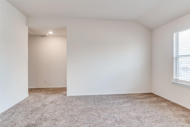 1653 Seadrift Dr, Forney, TX 75126 - carpeted empty room with healthy amount of natural light, vaulted ceiling, and recessed lighting