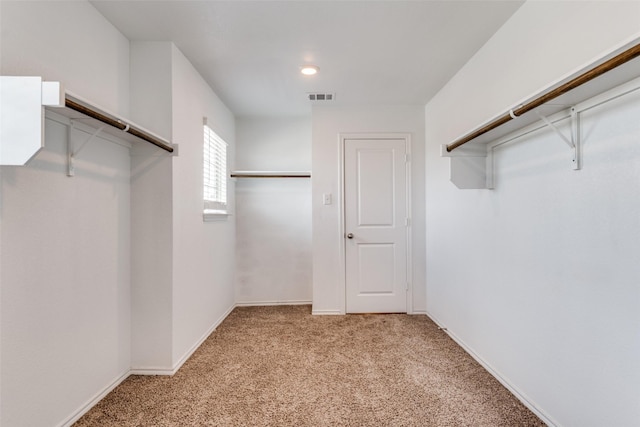 1653 Seadrift Dr, Forney, TX 75126 - walk in closet featuring light colored carpet