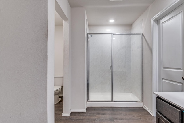 1653 Seadrift Dr, Forney, TX 75126 - bathroom with wood finished floors, a shower stall, and vanity