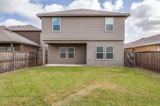 1653 Seadrift Dr, Forney, TX 75126 - back of property with a patio area, a fenced backyard, and a gate