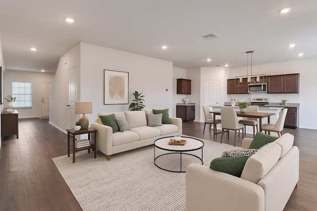1653 Seadrift Dr, Forney, TX 75126 - living area with dark wood finished floors and recessed lighting