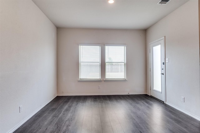 1653 Seadrift Dr, Forney, TX 75126 - empty room with dark wood-type flooring and plenty of natural light