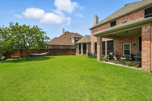 8161 Watson Rd, Lantana, TX 76226 - fenced backyard with a patio
