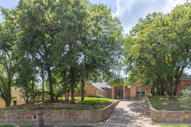 1211 Circle Ln, Bedford, TX 76022 - view of property hidden behind natural elements