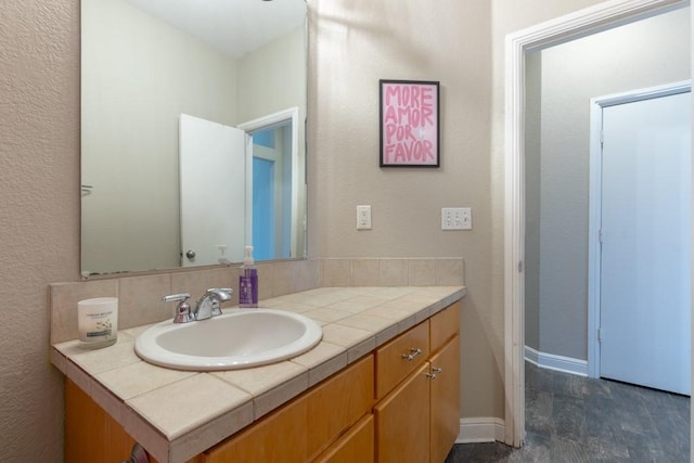 1211 Circle Ln, Bedford, TX 76022 - bathroom with vanity and baseboards