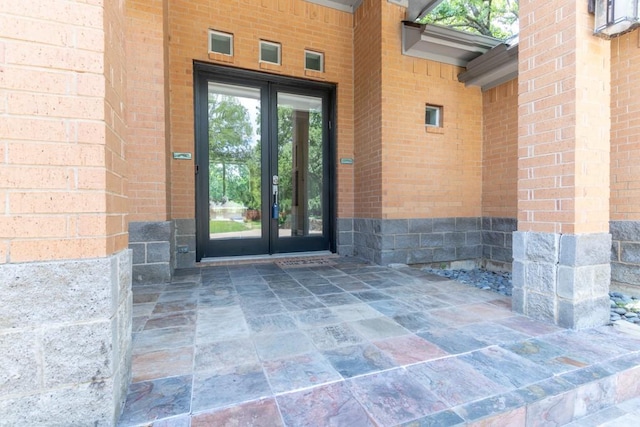 1211 Circle Ln, Bedford, TX 76022 - entrance to property featuring french doors and brick siding