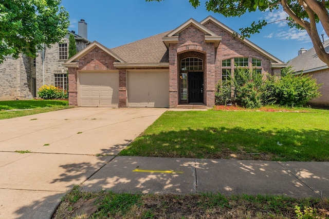 6736 Braeview Dr, Fort Worth, TX 76137 - traditional-style house with brick siding, an attached garage, a front lawn, and concrete driveway