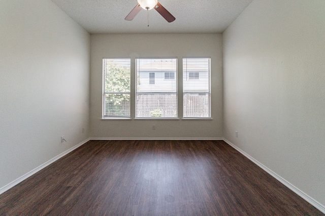 6736 Braeview Dr, Fort Worth, TX 76137 - spare room with dark wood-style flooring and a ceiling fan