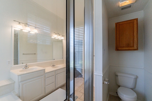 6736 Braeview Dr, Fort Worth, TX 76137 - full bath with double vanity and tile patterned flooring