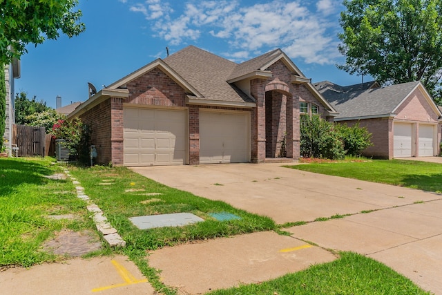 6736 Braeview Dr, Fort Worth, TX 76137 - view of front of house featuring brick siding, a shingled roof, a garage, and concrete driveway