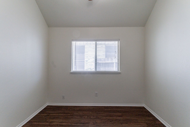 6736 Braeview Dr, Fort Worth, TX 76137 - spare room featuring dark wood finished floors and vaulted ceiling