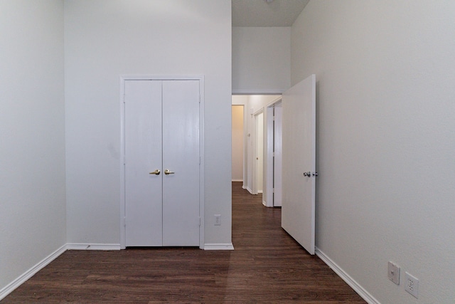 6736 Braeview Dr, Fort Worth, TX 76137 - unfurnished bedroom with dark wood finished floors and a closet