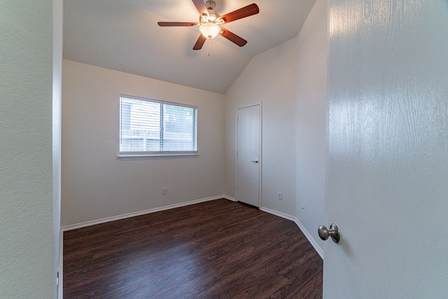 6736 Braeview Dr, Fort Worth, TX 76137 - empty room with dark wood-style flooring, lofted ceiling, and ceiling fan