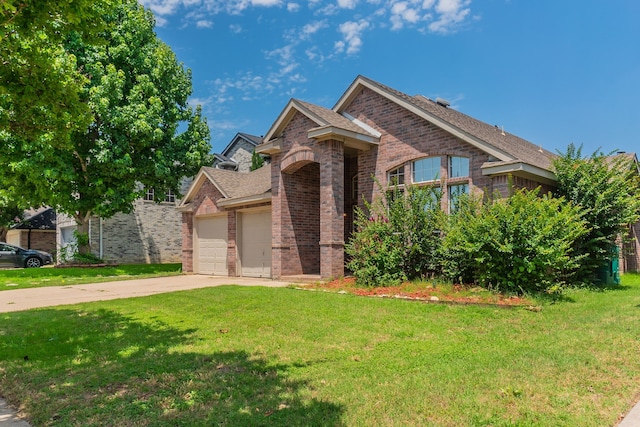 6736 Braeview Dr, Fort Worth, TX 76137 - view of front of property featuring brick siding, concrete driveway, a front lawn, and an attached garage