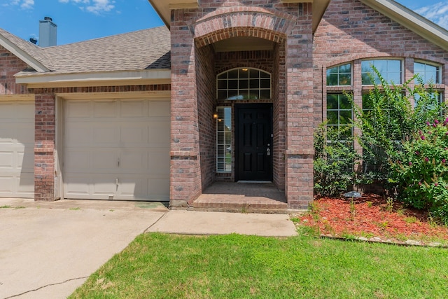 6736 Braeview Dr, Fort Worth, TX 76137 - entrance to property featuring brick siding, driveway, a shingled roof, and an attached garage