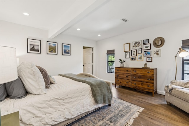 6619 Aintree Cir, Dallas, TX 75214 - bedroom with wood finished floors, recessed lighting, and beam ceiling