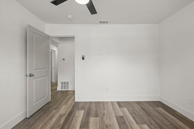 4807 Bedford Dr, Mesquite, TX 75150 - empty room with a ceiling fan and wood finished floors