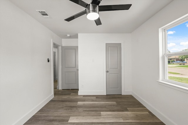 4807 Bedford Dr, Mesquite, TX 75150 - unfurnished bedroom with wood finished floors and ceiling fan