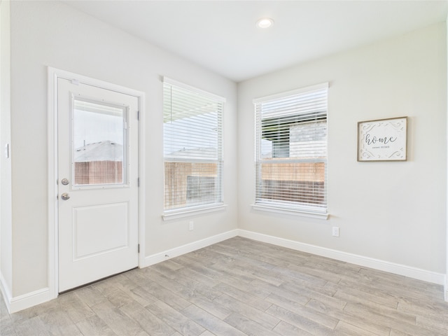 1016 Croxley Way, Fort Worth, TX 76247 - empty room with light wood-style floors and recessed lighting