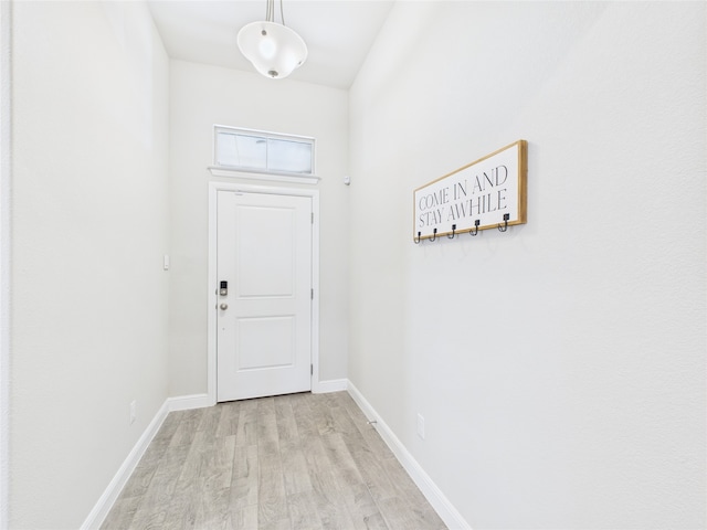 1016 Croxley Way, Fort Worth, TX 76247 - doorway to outside featuring light wood-style floors and baseboards