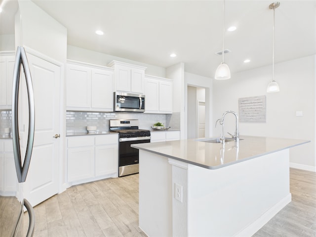 1016 Croxley Way, Fort Worth, TX 76247 - kitchen featuring appliances with stainless steel finishes, light wood-style floors, backsplash, white cabinets, and recessed lighting