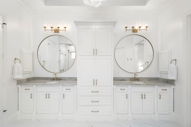 1861 Sand Creek Dr, Prosper, TX 75078 - bathroom with marble finish floors, double vanity, a shower, and ornamental molding