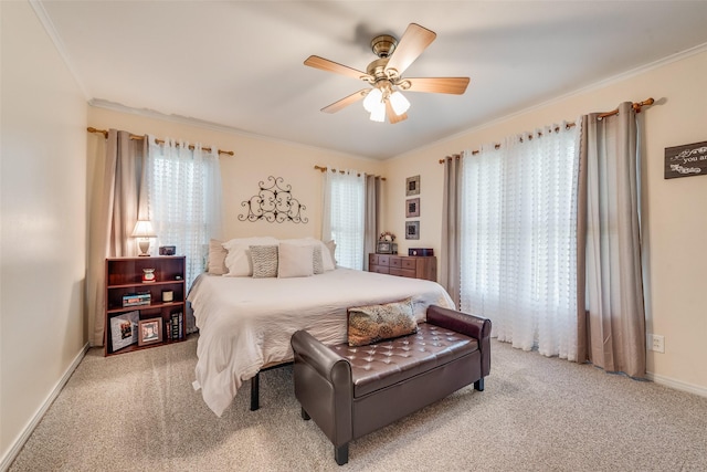 1102 Griffith Ave, Terrell, TX 75160 - bedroom with light colored carpet, ornamental molding, and a ceiling fan