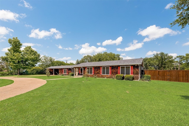 1102 Griffith Ave, Terrell, TX 75160 - ranch-style home featuring brick siding and curved driveway