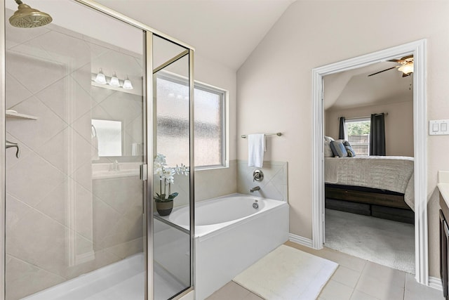 11513 Champion Creek Dr, Frisco, TX 75036 - ensuite bathroom with a garden tub, a shower stall, vaulted ceiling, tile patterned flooring, and a ceiling fan