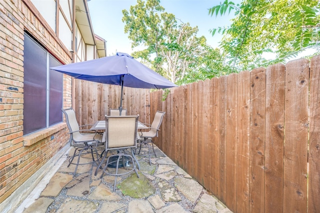 1161 Dallas Dr, Denton, TX 76205 - view of patio with outdoor dining area