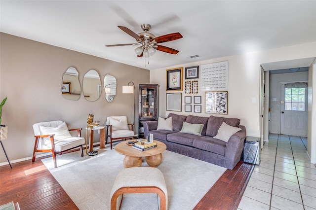 1161 Dallas Dr, Denton, TX 76205 - living area featuring a ceiling fan and light wood finished floors