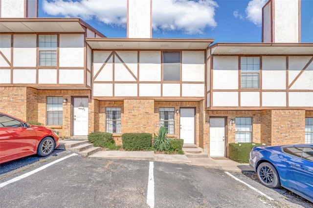 1161 Dallas Dr, Denton, TX 76205 - view of building exterior featuring uncovered parking