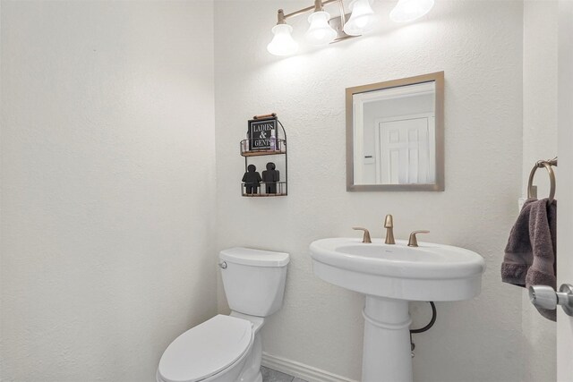 1512 La Paz Dr, Plano, TX 75074 - half bath featuring toilet and baseboards