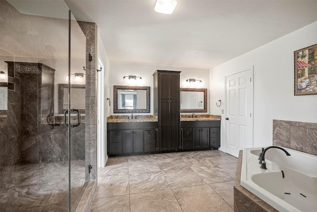 1512 La Paz Dr, Plano, TX 75074 - bathroom featuring a garden tub, a stall shower, vanity, and marble look tile flooring