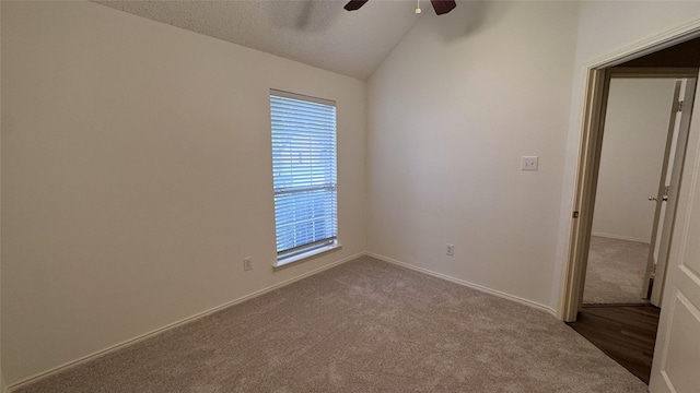 2217 Lone Pecan Dr, Garland, TX 75040 - carpeted empty room with a ceiling fan and lofted ceiling