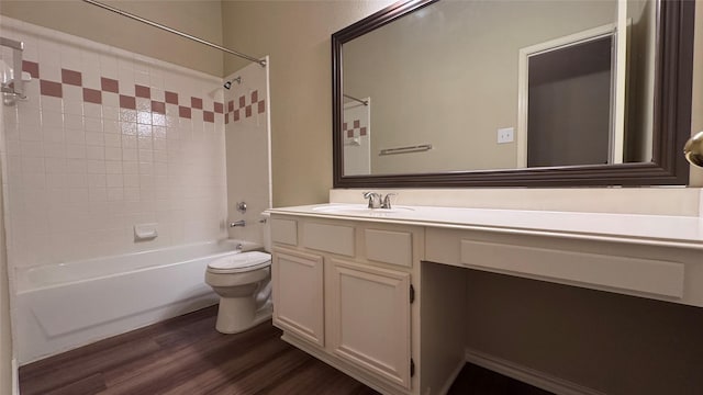 2217 Lone Pecan Dr, Garland, TX 75040 - bathroom with bathtub / shower combination, vanity, and wood finished floors