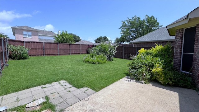 2217 Lone Pecan Dr, Garland, TX 75040 - fenced backyard with a patio