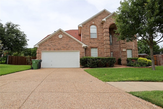 2325 Denham Dr, Arlington, TX 76001 - traditional-style house featuring brick siding, concrete driveway, and an attached garage