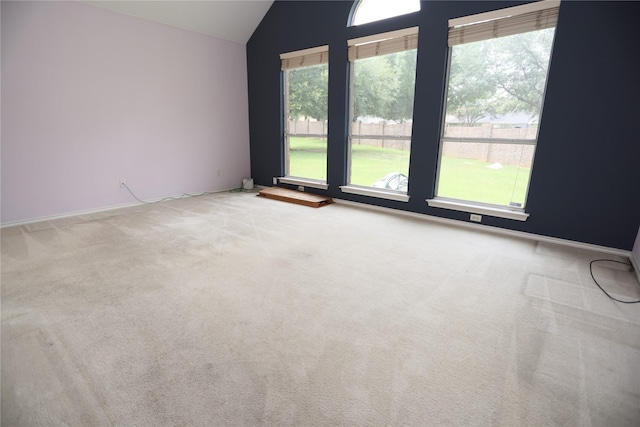 2325 Denham Dr, Arlington, TX 76001 - carpeted empty room featuring vaulted ceiling