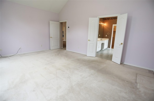 2325 Denham Dr, Arlington, TX 76001 - unfurnished bedroom with light colored carpet and high vaulted ceiling