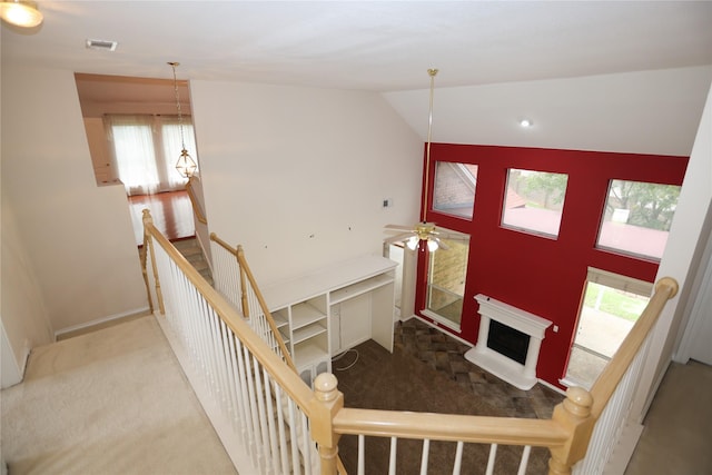 2325 Denham Dr, Arlington, TX 76001 - foyer with heating unit, carpet, plenty of natural light, and lofted ceiling
