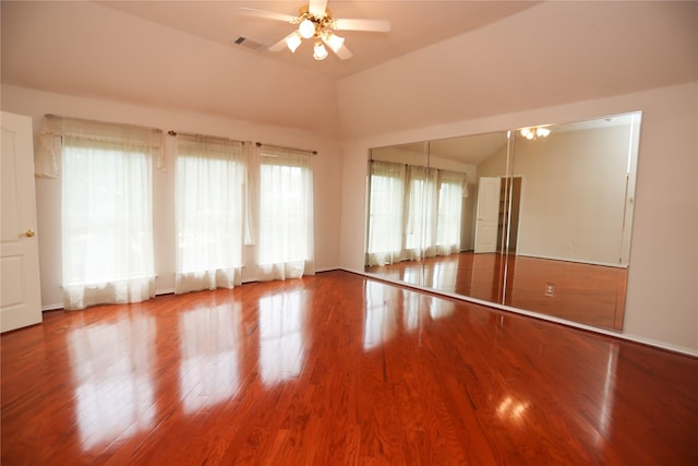 2325 Denham Dr, Arlington, TX 76001 - unfurnished room with a ceiling fan, wood finished floors, and vaulted ceiling
