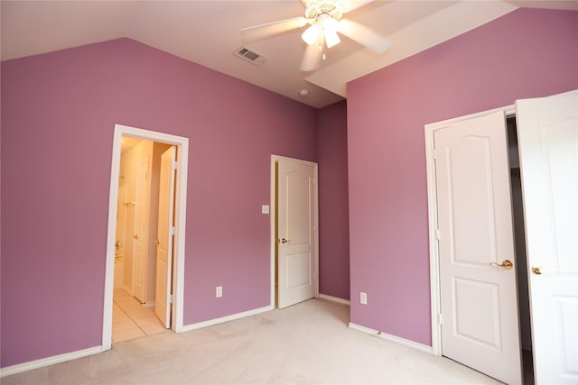 2325 Denham Dr, Arlington, TX 76001 - unfurnished bedroom featuring light colored carpet, lofted ceiling, ensuite bathroom, and a ceiling fan