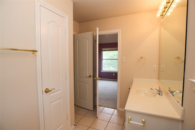 2325 Denham Dr, Arlington, TX 76001 - bathroom with tile patterned floors and vanity