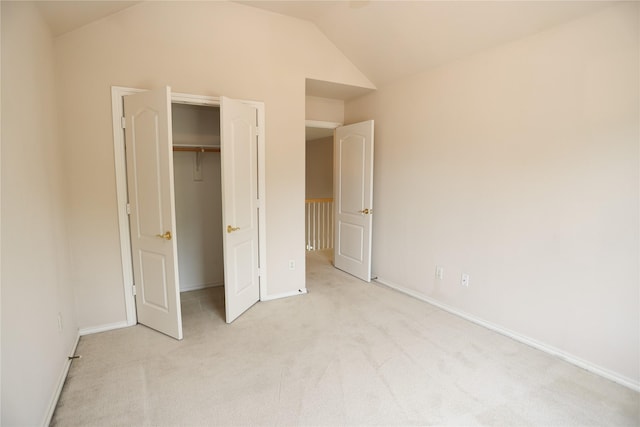 2325 Denham Dr, Arlington, TX 76001 - unfurnished bedroom featuring light colored carpet and lofted ceiling