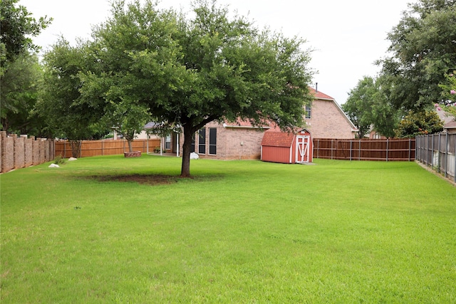 2325 Denham Dr, Arlington, TX 76001 - fenced backyard with a shed