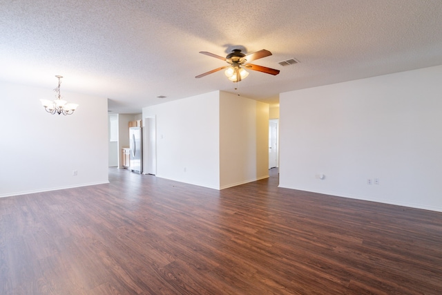 233 Stoneridge Dr, Mesquite, TX 75149 - unfurnished living room featuring a chandelier, dark wood-style floors, a ceiling fan, and a textured ceiling