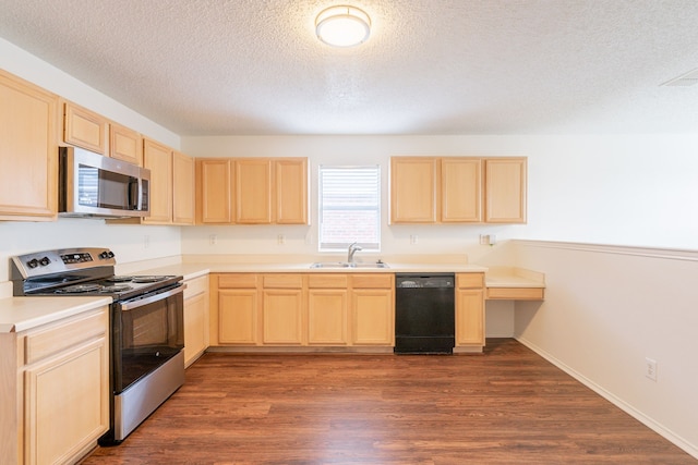 233 Stoneridge Dr, Mesquite, TX 75149 - kitchen featuring stainless steel appliances, light brown cabinetry, a textured ceiling, dark wood-type flooring, and light countertops