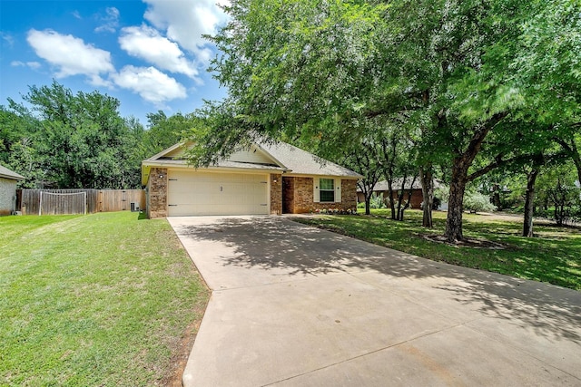 1414 Cheyenne Trl, Granbury, TX 76048 - view of front of property with concrete driveway, brick siding, and a garage