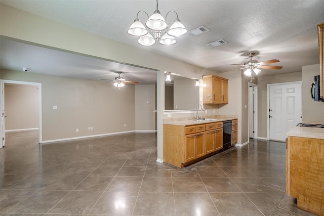1414 Cheyenne Trl, Granbury, TX 76048 - kitchen with black dishwasher, ceiling fan, light countertops, dark tile patterned floors, and a textured ceiling
